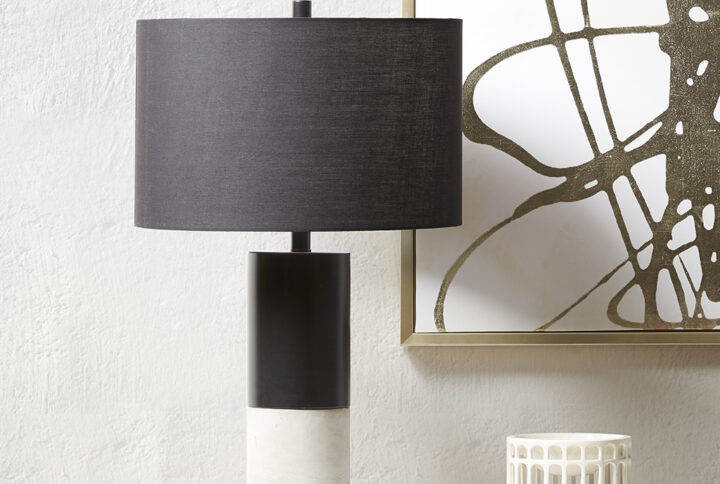 Define your space with the decadence of INK+IVY's Fulton Concrete Table Lamp. The steel and concrete base flaunts a black finish that spirals around itself for a modern look. A fabric drum-shaped shade lavishly complements the base with its dark hue. The 72-inch clear cord provides plenty of length to place the lamp in your living room or bedroom for extra light