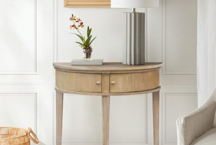 Martha Stewart’s Bedford Home serves as the inspiration for the farmhouse charm of the Crestview Storage Console Table. Flaunting a demilune shape