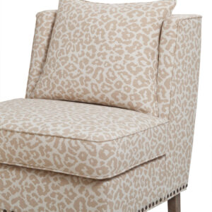 This armless chair offers a deluxe seat cushion and a subtle application of fun animal print fabric making it a stylish accent for any room in the home. Leg assembly required.