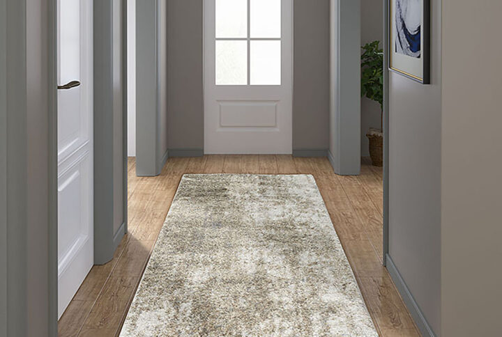 Elevate the style of your living space with the Madison Park Haley Cozy Shag Abstract Area Rug. This soft plush area rug showcases a grey and cream abstract design to create a gorgeous modern look. The super soft