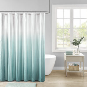 Add a refreshing touch to your bathroom decor with our Madison Park Ara Ombre Printed Seersucker Shower Curtain. This shower curtain features an aqua ombre print on an embossed seersucker fabric