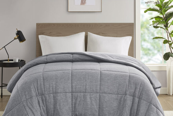 Dive into this cool and comfortable jersey knit down alternative comforter. Made from 50% nylon and 50% polyester