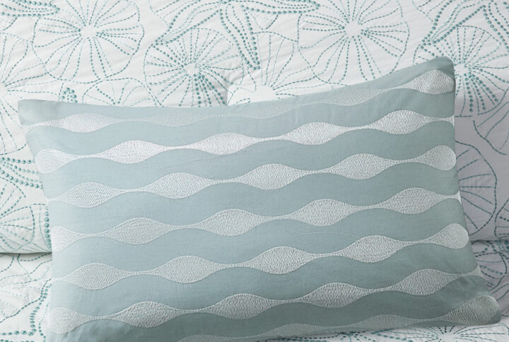 Bring the ocean into your home with the Harbor House Maya Bay Collection. This 100% cotton oblong decorative pillow is embroidered for added dimension and features a dark seafoam blue to tie into the main Maya Bay bedding collection. Dry clean only