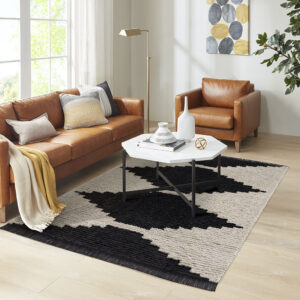 Complete your home decor with the bold allure of the Madison Park Amanda Black & Ivory Modern Area Rug. This plush area rug features a super soft