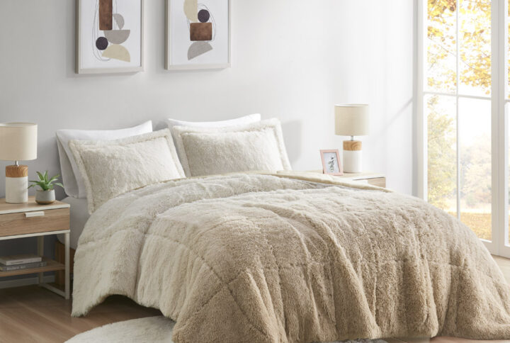 Create a cozy and comfy space with the Intelligent Design Brielle Shaggy Faux Fur Comforter Mini Set. This shaggy fur comforter features an ombre design with a soft