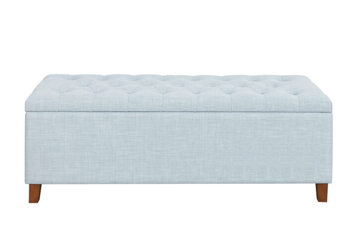 The Madison Park Shandra Upholstered Storage Bench blends style and function with a tufted button top and a spacious interior compartment (44.5"W x 15"D x 11"H) for concealed storage. Ideal for entryways