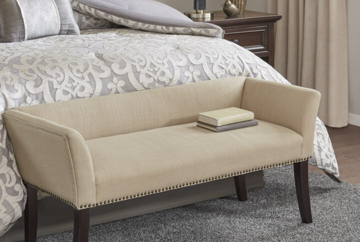 Elevate your space with the Welburn Upholstered Bench from Madison Park. Compact yet elegant