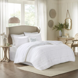 Elevate your bedroom with the Madison Park Celeste 5 Piece Ruffled Comforter Set