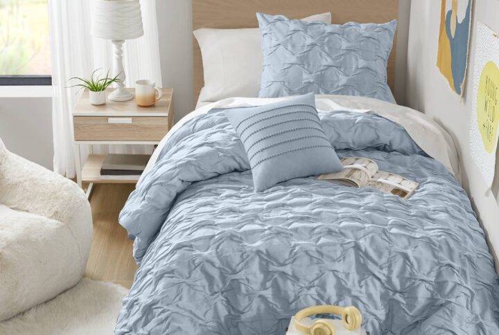 This comforter set combines casual elegance with all-season coziness