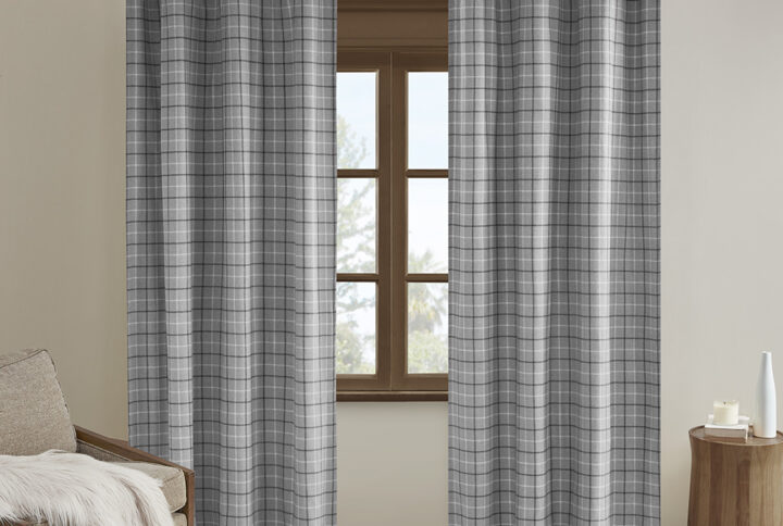 The Madison Park Anaheim Plaid Faux Leather Tab Top Panel with Fleece Lining brings a stylish