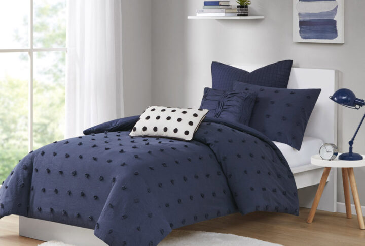 The Urban Habitat Brooklyn Cotton Jacquard Duvet Cover Set features small tufted chenille dots that create a fresh shabby chic look. This duvet cover set brings a soft and charming update to your bedroom