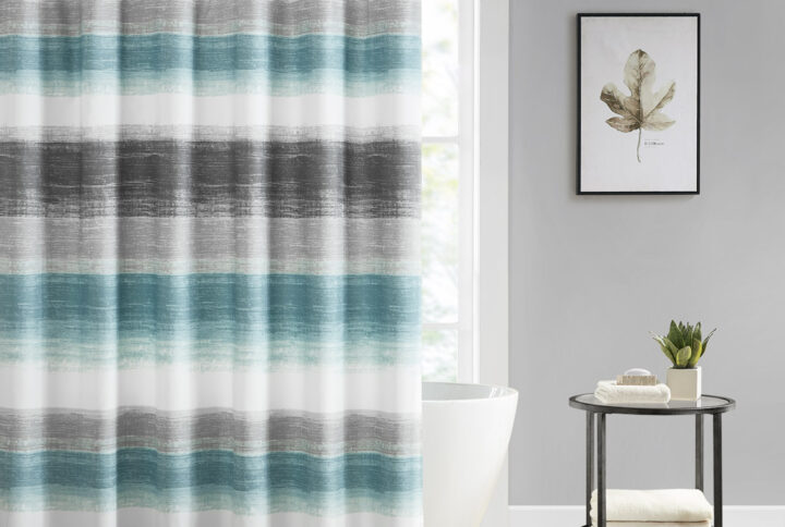 The Madison Park Essentials Saben Shower Curtain provides a modern update to your bathroom. A watercolor stripe print is beautifully displayed on the ultra-soft microfiber Shower Curtain. Bringing the best in health and wellness