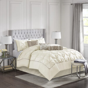 This beautifully tufted bed is from the Laurel bedding collection. Its ivory coloring makes this set easy to accessorize in your bedroom. The collection is made from 100% polyester polyoni and has pieced fabric sewn together to give this set added dimension. It is finished with a smooth edge of fabric that creates a beautiful border around this comforter. Items in the set may come in a rolled or compressed packaging