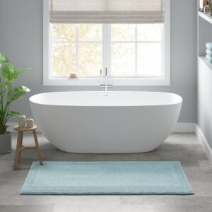 The Madison Park Signature Splendor 100% Cotton Tufted 3000 GSM Reversible Bath Rug brings incredible comfort and softness to your bathroom decor. This 100% cotton bath rug features a superior tufted top construction in a heavy 3000gsm weight