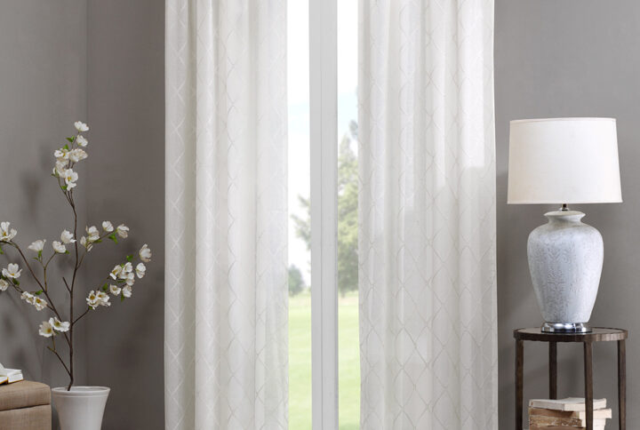 Madison Park’s Irina Diamond Sheer Window Curtain provides an alluring update to your home. An elegant diamond pattern is beautifully embroidered on a soft sheer fabric