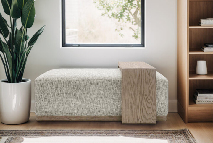 The Chapel Hill Peggy Bench/Cocktail Ottoman with Table combines elegance with practical functionality. This contemporary design  is built on a sturdy wood frame
