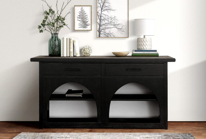 The Chapel Hill Grayson Console brings timeless Arts and Crafts style to any space with its solid wood construction and wire-brushed black and grey finish. Designed for versatility