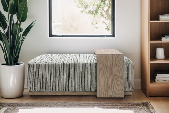 The Chapel Hill Peggy Bench/Cocktail Ottoman with Table combines elegance with practical functionality. This contemporary design  is built on a sturdy wood frame