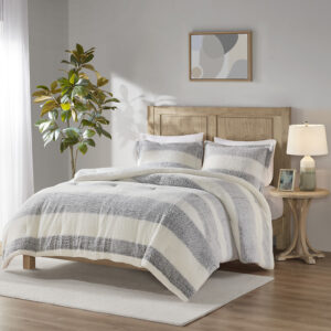 This modern and cozy comforter set gives your bedroom a rustic feel with its farmhouse-style design and striped sherpa material. Complete with a comforter and 2 shams