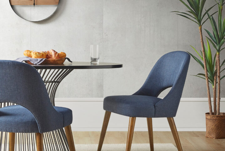 Elevate any space with the INK+IVY Nola Upholstered Dining Side Chairs (set of 2). These versatile