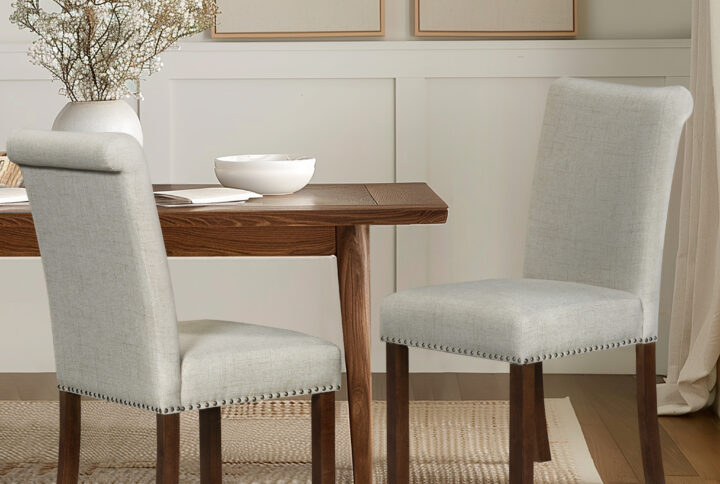 Embrace timeless elegance with the Aubrey Dining Chair Set from 510 Design. These chairs feature a transitional style