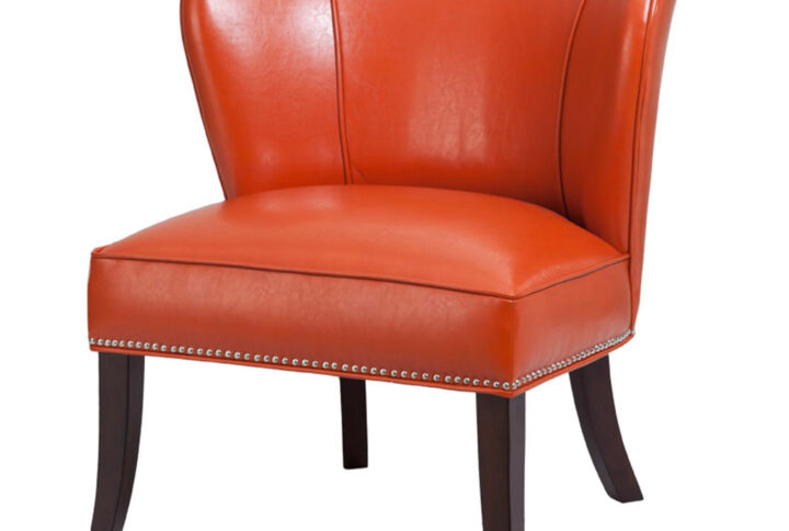 this accent chair features individually placed silver nail heads to create an elegant trim on the faux leather upholstery. High-density foam filling offers and solid wood frame provides exceptional comfort and support. The solid wood legs showcase a dark finish that creates a beautiful contrast with the faux leather upholstery