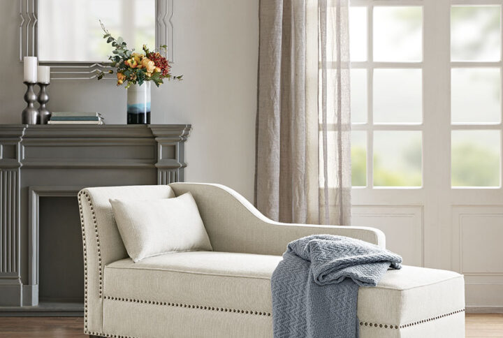 Lay back and relax in the comfort of the Madison Park Trinity Accent Chaise. This chaise lounge is upholstered in a natural-hued fabric and features a low back that creates a simple