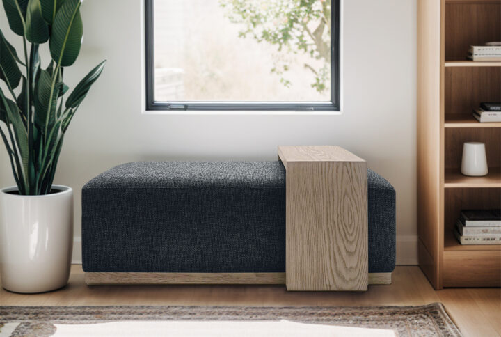 The Chapel Hill Peggy Bench/Cocktail Ottoman with Table combines elegance with practical functionality. This contemporary design  is built on a sturdy wood frame