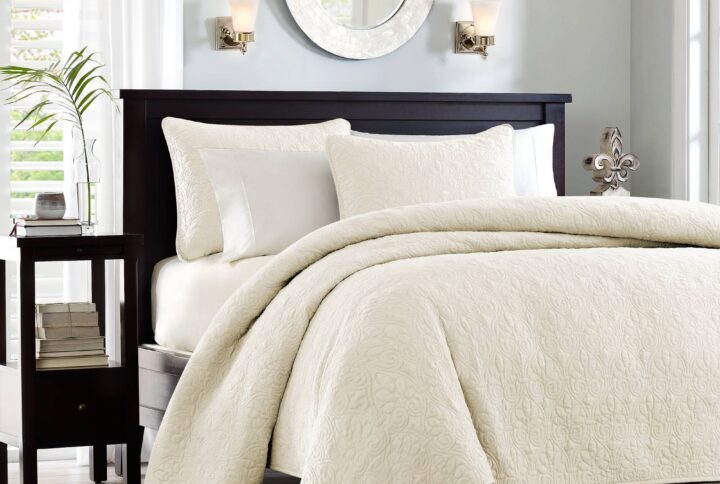 The Madison Park Quebec Reversible Quilt Set offers a charming cottage-inspired update to your bedroom. The quilt and shams (1 in Twin/TwinXL) flaunt a classic stitch pattern that creates a rich depth and texture on the face of the bedding set. Prewashed cotton filling provides added comfort and durability making it the perfect for use in the summer or as a layering piece in the winter. This quilt also has an antimicrobial treatment that provides built-in freshness protection