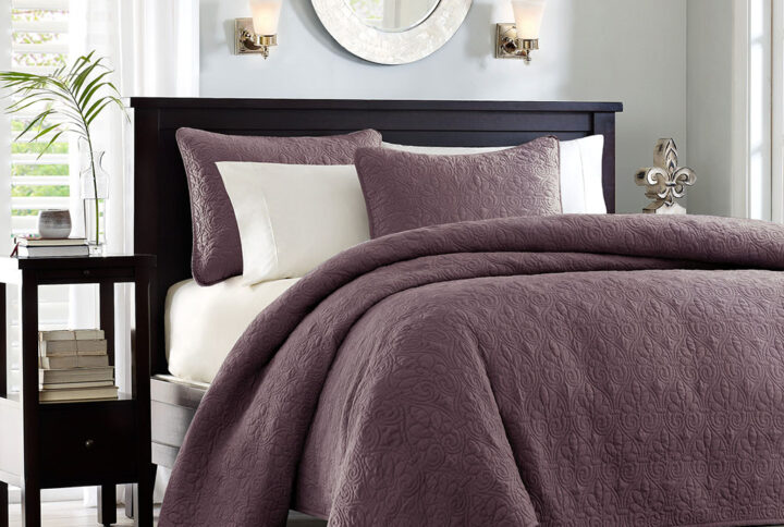 The Madison Park Quebec Reversible Quilt Set offers a charming cottage-inspired update to your bedroom. The quilt and shams (1 in Twin/TwinXL) flaunt a classic stitch pattern that creates a rich depth and texture on the face of the bedding set. Prewashed cotton filling provides added comfort and durability making it the perfect for use in the summer or as a layering piece in the winter. This quilt also has an antimicrobial treatment that provides built-in freshness protection