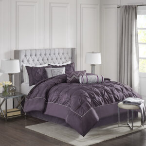 This beautifully tufted bed is from the Laurel bedding collection. Its deep plum coloring makes this set create a statement in your bedroom. The collection is made from 100% polyester polyoni and has pieced fabric sewn together to give this set dimension. It is finished with a smooth edge of fabric that creates a beautiful border around this comforter. Items in the set may come in a rolled or compressed packaging