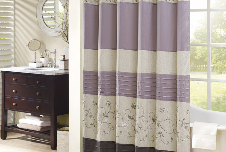 Add an elegant addition to your bathroom with the Madison Park Serene shower curtain. Its rich purple and delicate embroidery are the perfect combination. This 72x72" shower curtain is machine washable for easy care. Complete the look with coordinating bedding available and sold separately.