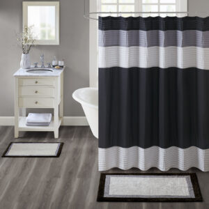 The Madison Park Amherst Cotton Tufted Bath Rug Collection provides a stylish and sophisticated look for your bathroom. Made from 100% tufted cotton