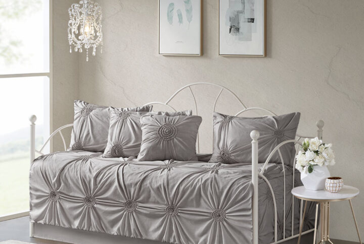 Grace your bedroom with the beauty and comfort of the Madison Park Leila 6 Piece Reversible Daybed Cover Set. The gorgeous dark grey daybed cover flaunts tufting and ruche detailing in a puckered diamond design with quilted on reverse