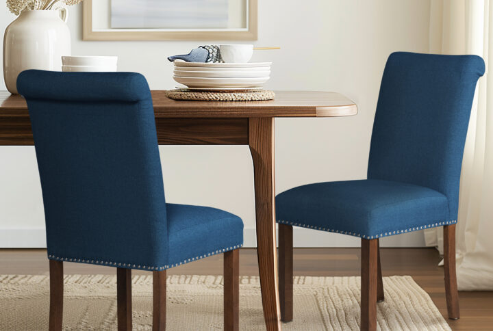 Embrace timeless elegance with the Aubrey Dining Chair Set from 510 Design. These chairs feature a transitional style
