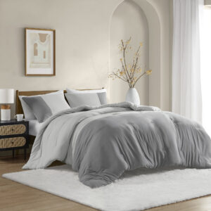 pre-washed bedding set displaying a charming color block design. Pieced together in two tones