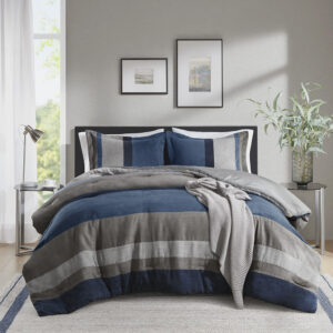 Experience luxury with this pieced bedding set featuring a transitional stripe pattern and solid backing crafted from premium faux suede. The fluffy texture enhanced by the high-quality polyester filling