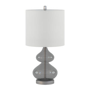 ambient glow. Each lamp is topped with a white fabric drum shade and a gold metal finial for a sophisticated touch. Designed for versatility