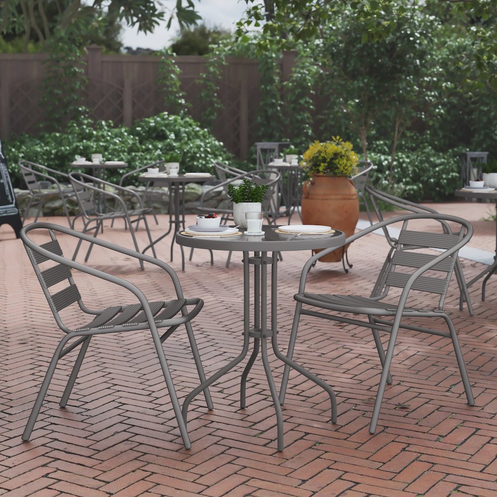 23.75” Round Glass Top Metal Table with 2 Silver Aluminum Slat Stack Chairs