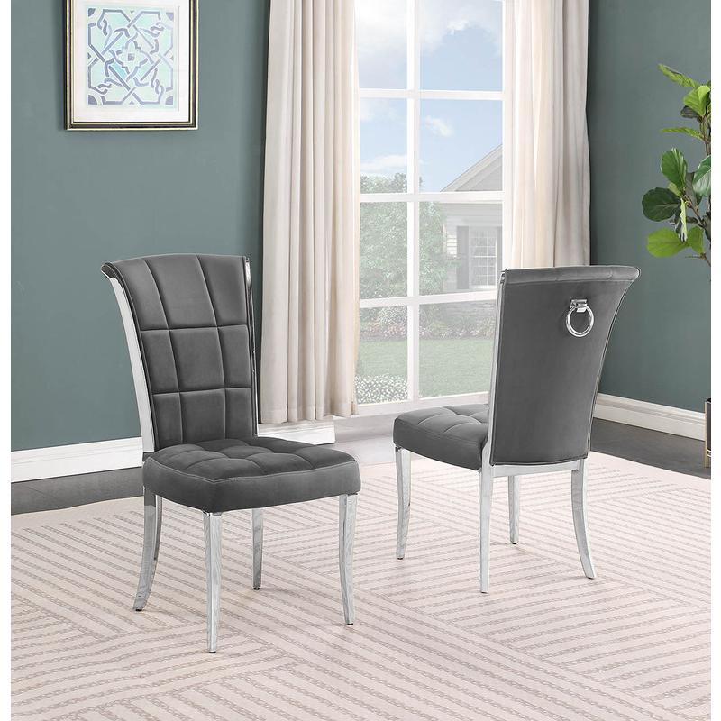 9-piece glam dining set with 8 dark grey chairs and a 95″ long glass  table