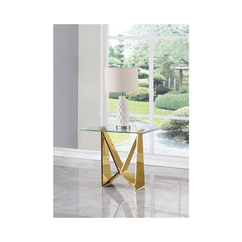 Clear glass End table with a gold color  base