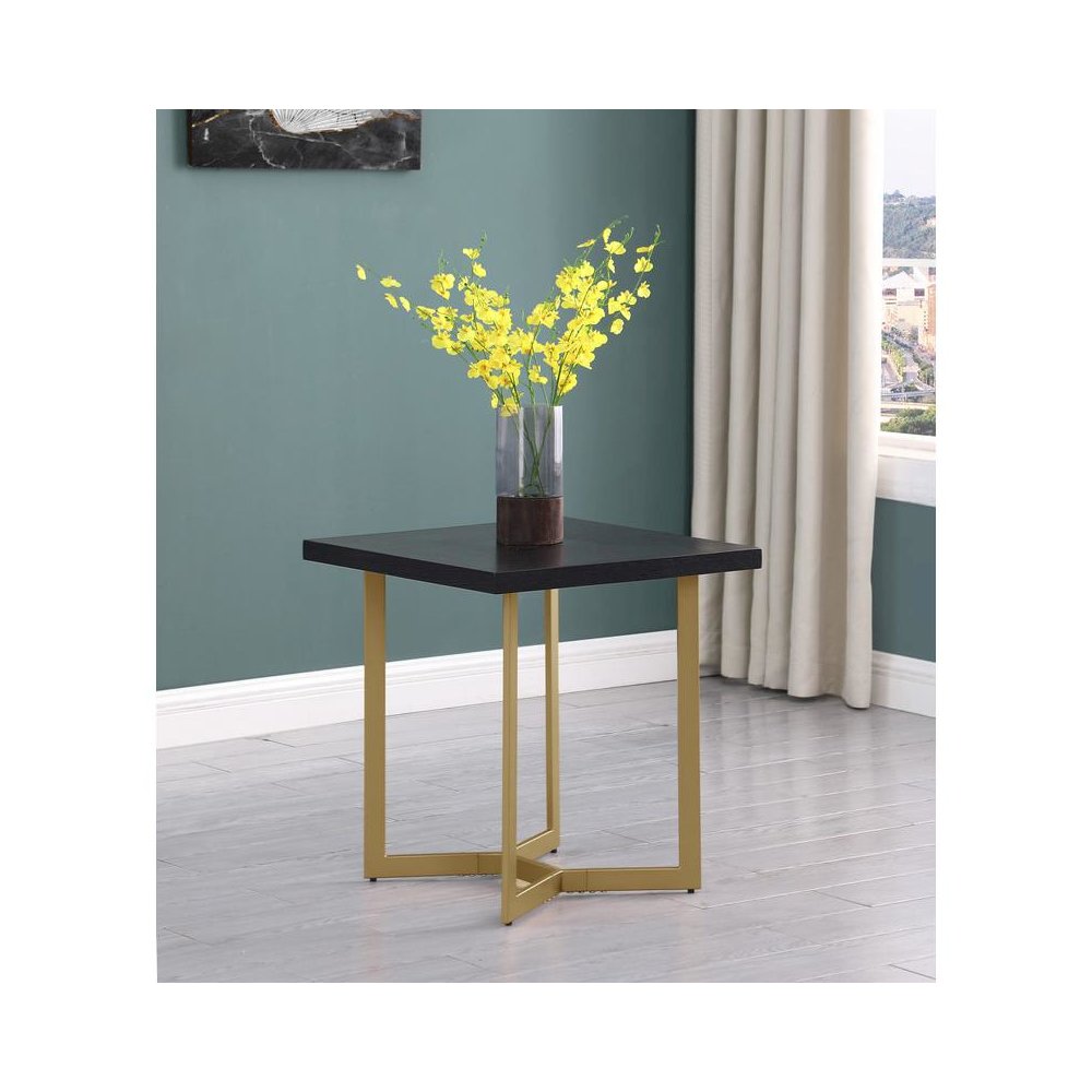 Black wood top end table w/ gold color iron legs