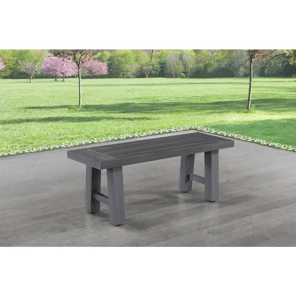 Outdoor patio dining bench made out of light weight PE wicker.