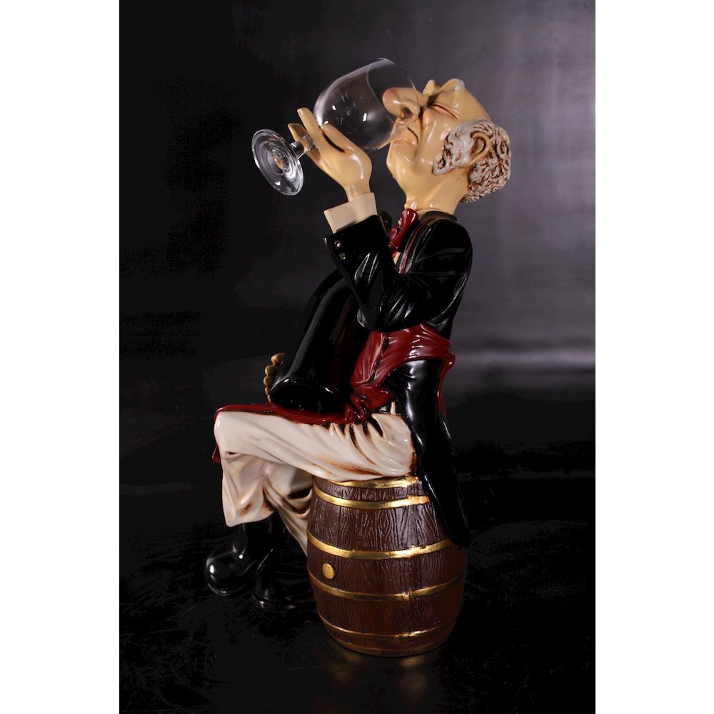 Sitting Connoisseur on Barrel