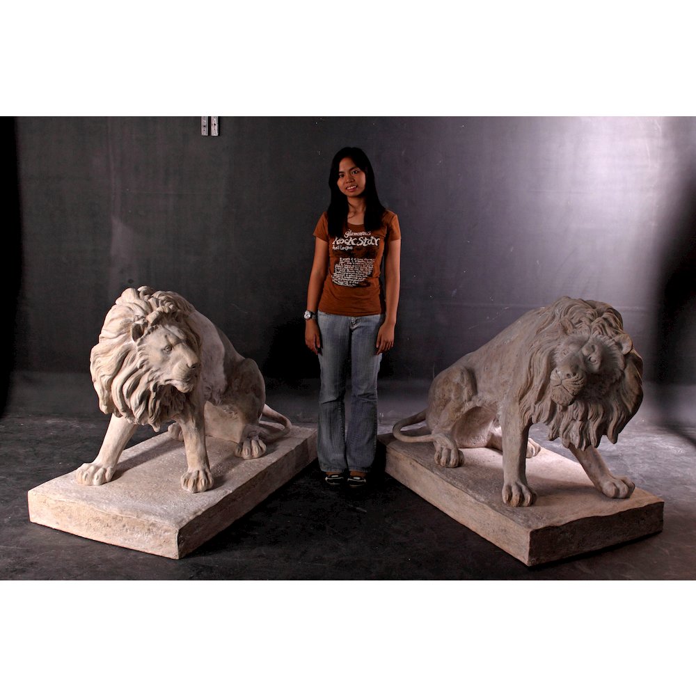 Symmetrical Pair of 39 Inch Entry Lions in Rough Stone