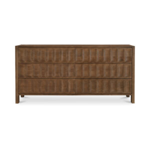 Some dressers store clothes. Roland stores confidence. Its carved drawer fronts bring a steady rhythm to the room—deep grooves and geometric patterning that feel sculptural without getting loud. The solid oak construction keeps everything grounded