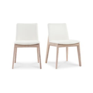 the Deco oak dining chair's adaptable design seamlessly complements both formal and casual settings. Its solid oak frame imparts a warm