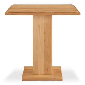 The May counter table's unique double square top and rectangular post leg create an intriguing visual harmony. Crafted from solid oak