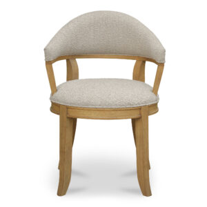 The Carlos dining chair's gracefully curved backrest and plush seat invite lingering conversations