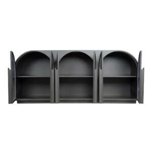 the Salone sideboard's seductive concept of partial concealment allows the furniture itself to take center stage rather than what lies hidden behind the Art Deco-inspired reeded glass doors. The oversized Beech door handles offer a graceful touch of contrast against the reeded glass doors. This juxtaposition of round arches and the straight